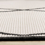 Bristol 6'7" x 9'6" White Black Trellis Reversible Area Rug - White