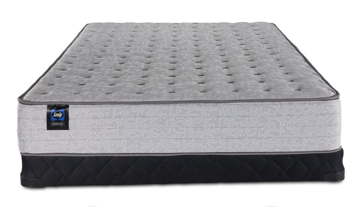 Sealy Burchelle Extra Firm Tight Top Twin mattress with black low profile boxspring, front view