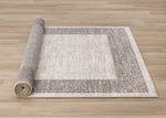 Earthly Essence 5'3" x 7'7" Distressed Border Area Rug - Taupe