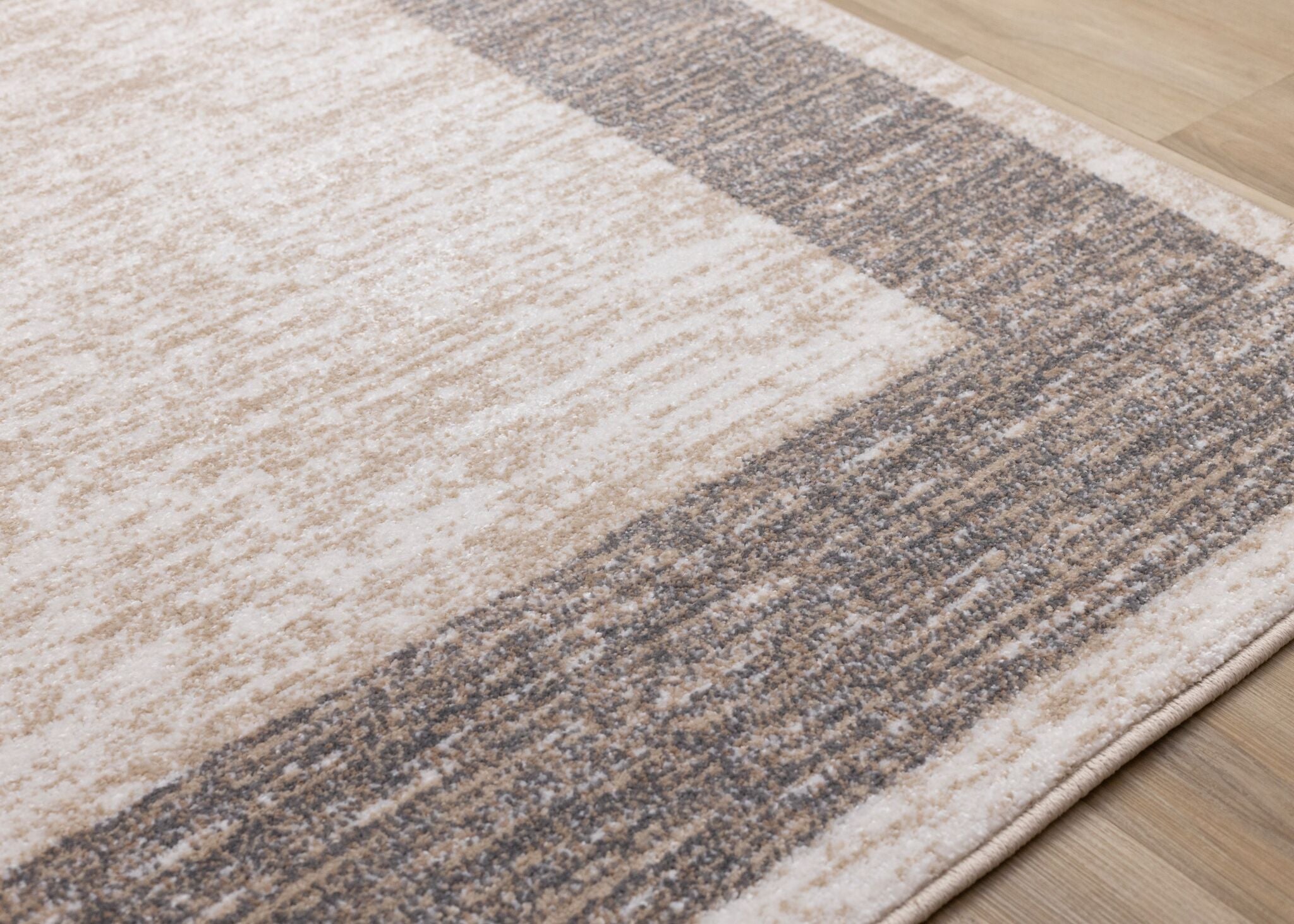 Earthly Essence 6'7" x 9'10" Distressed Border Area Rug - Taupe