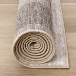Earthly Essence 6'7" x 9'10" Distressed Border Area Rug - Taupe