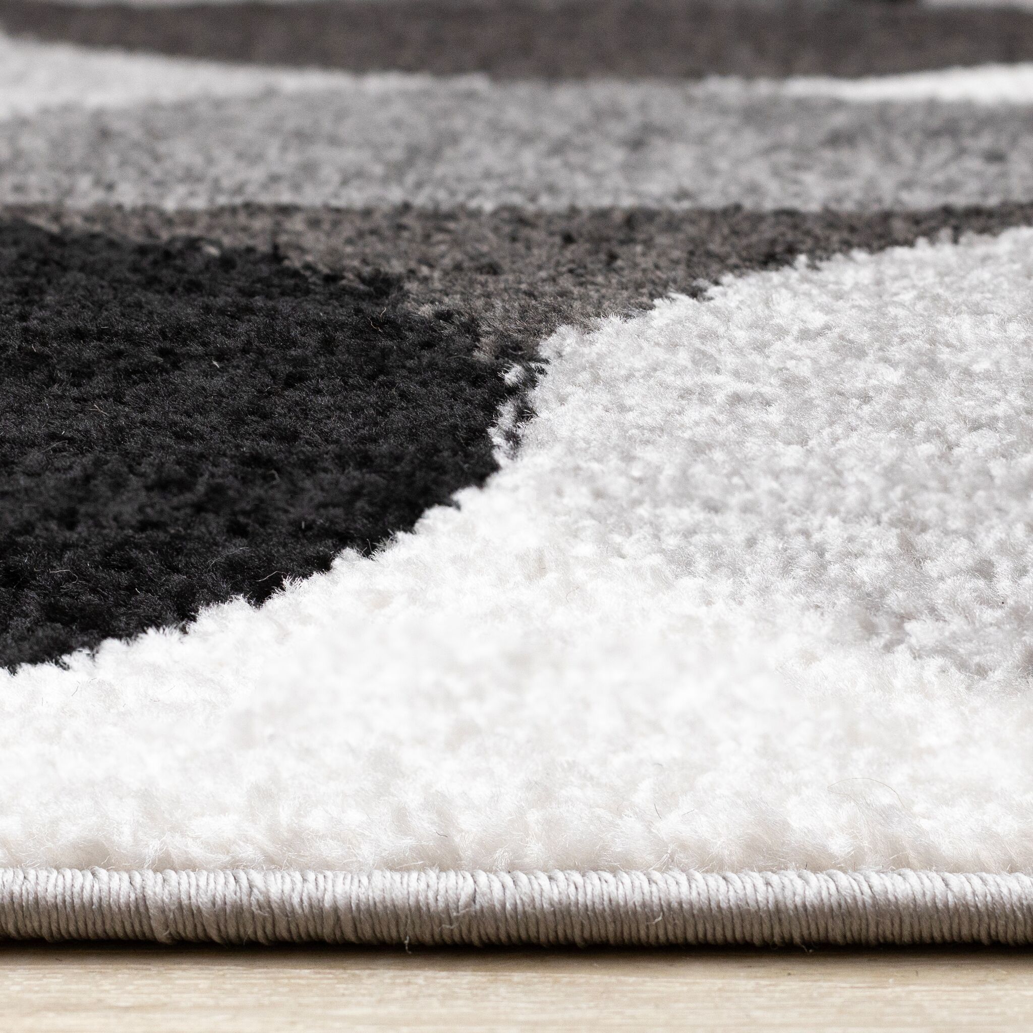 Eclipse 5'3" x 7'7" Mid-Century Modern Design Area Rug - Grey, Black, White