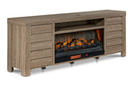 Great Falls 83.75" Fireplace TV Stand - Grey shown at an angle with electric fireplace, side cabinets and open media shelf