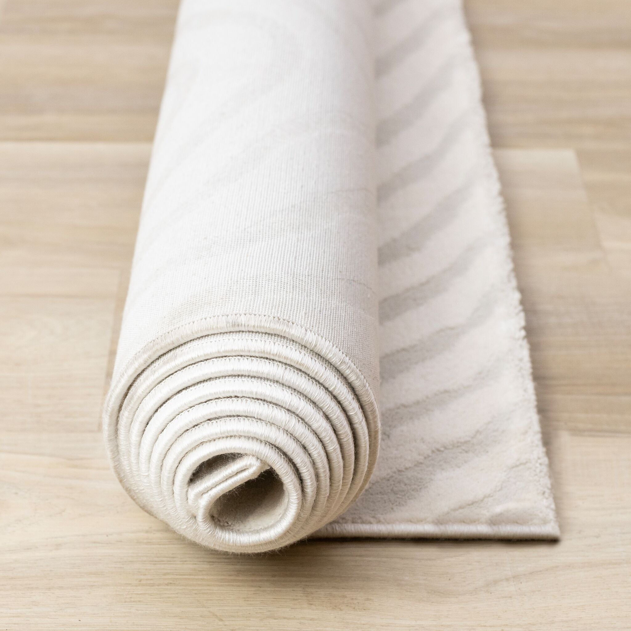 Hayden 6'7" x 9'6" Swirling Lines Area Rug - Grey