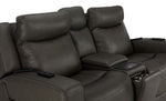 Jackson anthracite leather loveseat close-up showing padded headrests, stitched seats, remotes and centre console