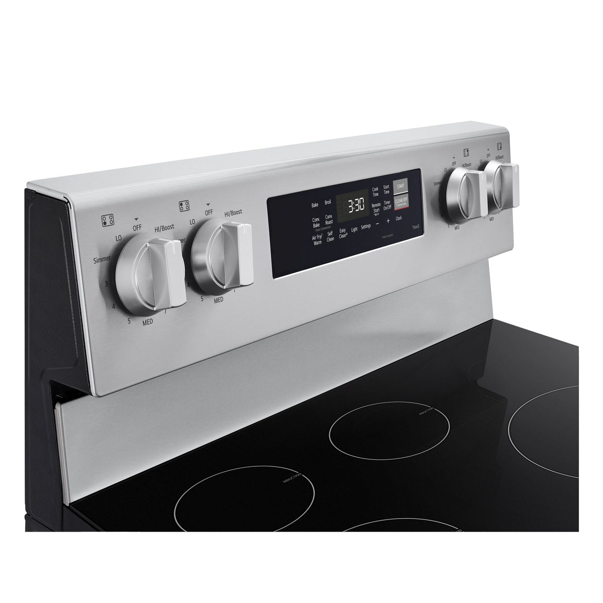Close-up of LG induction range rear control panel with four knobs, digital display and cooking mode buttons