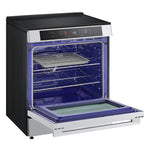 LG induction slide-in range with oven open, showing blue EasyClean interior, racks and air fry tray