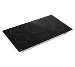 LG Black 36-inch Smart Induction Cooktop shown at an angle with five induction zones and illuminated touch controls