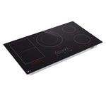 LG Black 36" Smart Induction Cooktop shown at an angle with five cooking zones, flexible zone and touch controls
