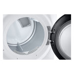 Close-up inside LG electric dryer drum showing lint filter and door hinge