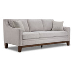 Lucerne grey sofa with three seat cushions, track arms, solid wood legs and angled front view