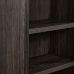Modern Edge bookcase close-up showing dark grey finish, shelf edge and frame moulding