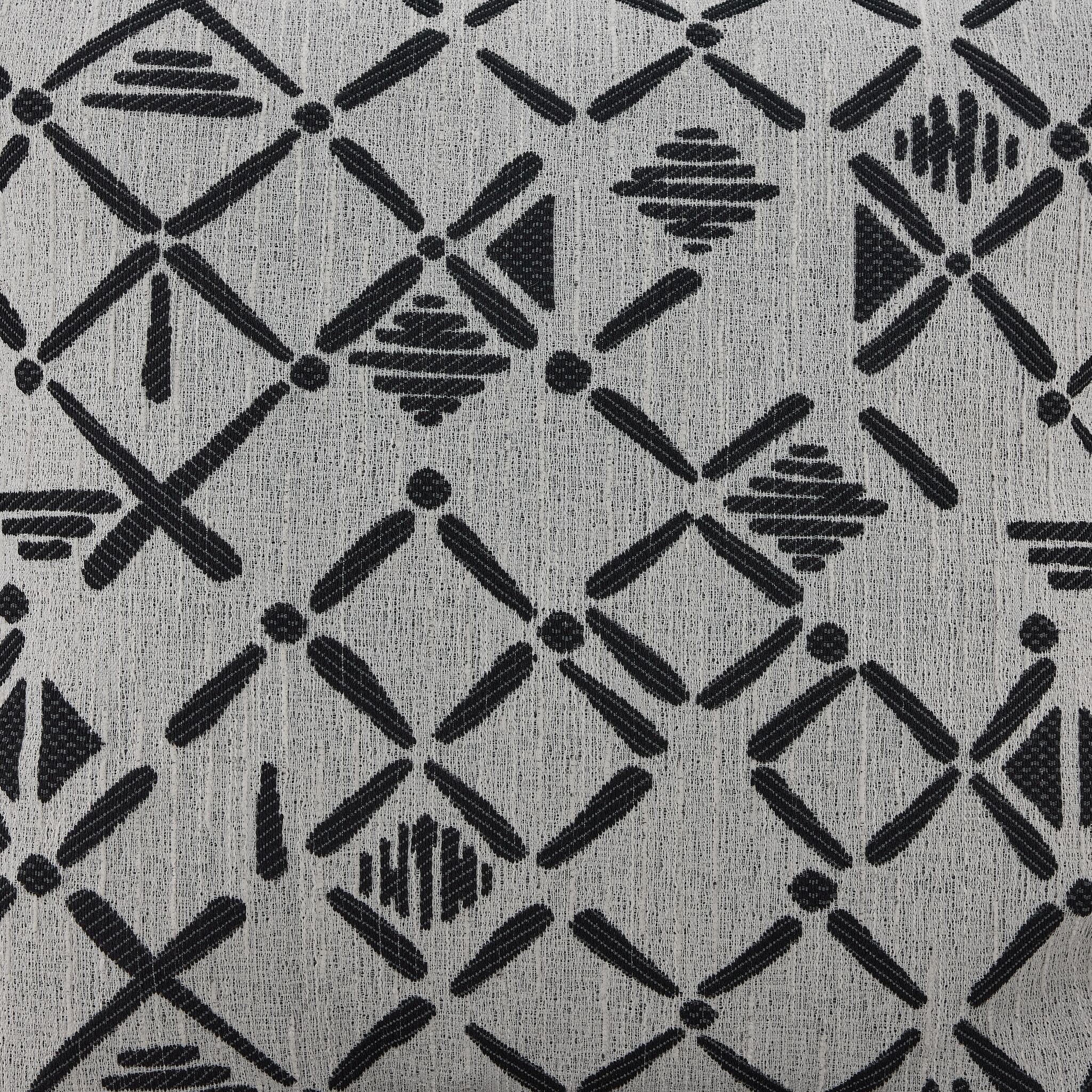 Moncton accent cushion close-up showing black and grey geometric pattern