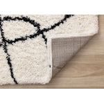 Pace 6'7" x 9'6" Outlinded Shapes Area Rug - Cream, Black