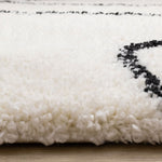 Pace 5'3" x 7'7" Outlinded Shapes Area Rug - Cream, Black