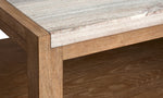 Plum Creek coffee table close-up showing marble top, wood grain and Sierra Brown finish