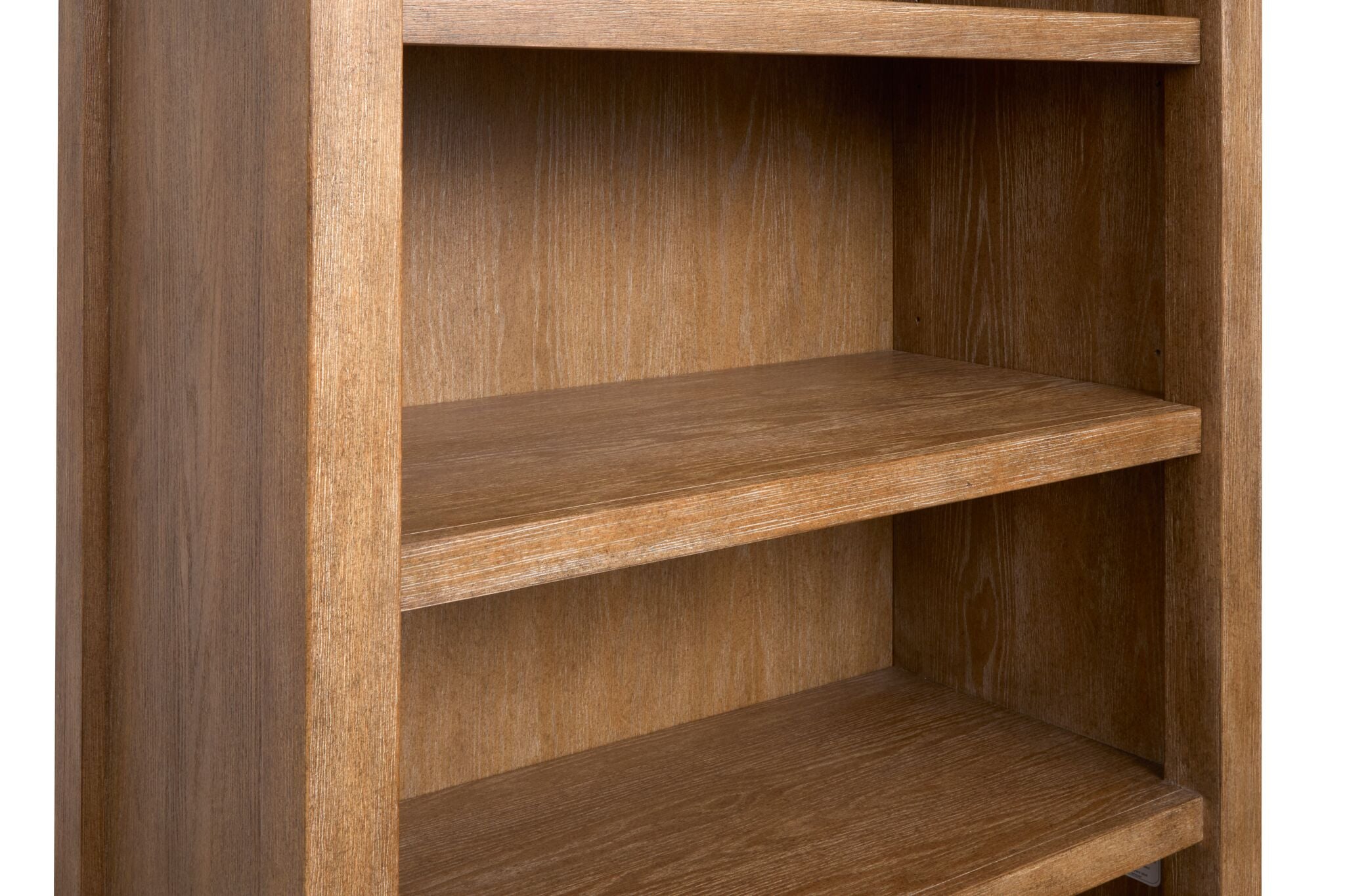 Plum Creek bookcase close-up showing wood grain shelf edge and Sierra Brown finish
