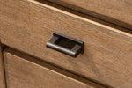 Plum Creek filing cabinet close-up showing drawer front, wood grain and oil-rubbed bronze hardware