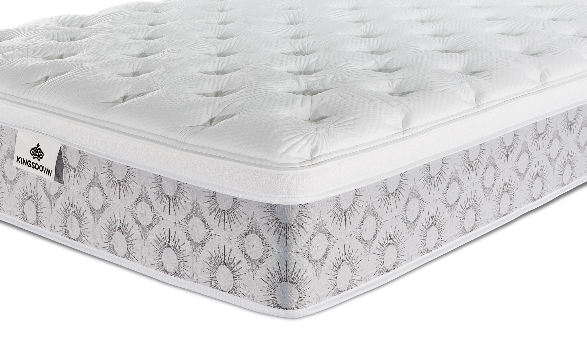 Close-up of the Kingsdown Quinlan Plush Euro Top king mattress showing the tufted top and grey patterned side panel