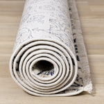 Midnight Garden 5'3" x 7'10" Ornate Leaf Pattern Area Rug - Cream