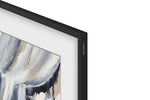 Close-up of Samsung 65-inch The Frame LS03HE Smart TV showing the slim black bezel, Samsung logo and white mat-style Art Mode display