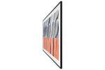 Angled side view of Samsung 85-inch The Frame LS03HE Smart TV highlighting its slim picture-frame profile and Art Mode display