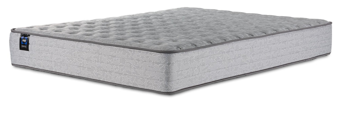 Sealy Burchelle Extra Firm Tight Top Queen mattress with grey quilted top and patterned side panels, three-quarter view