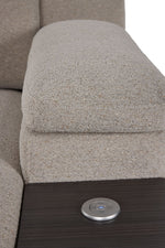 Close-up of Slayden left-facing taupe sectional showing padded armrest, side table and control panel