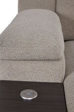 Close-up of Slayden right-facing taupe sectional showing padded armrest, side table and control panel