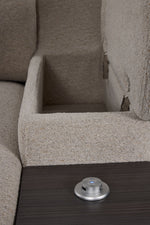 Close-up of Slayden left-facing taupe sectional showing open arm storage, side table and USB control panel