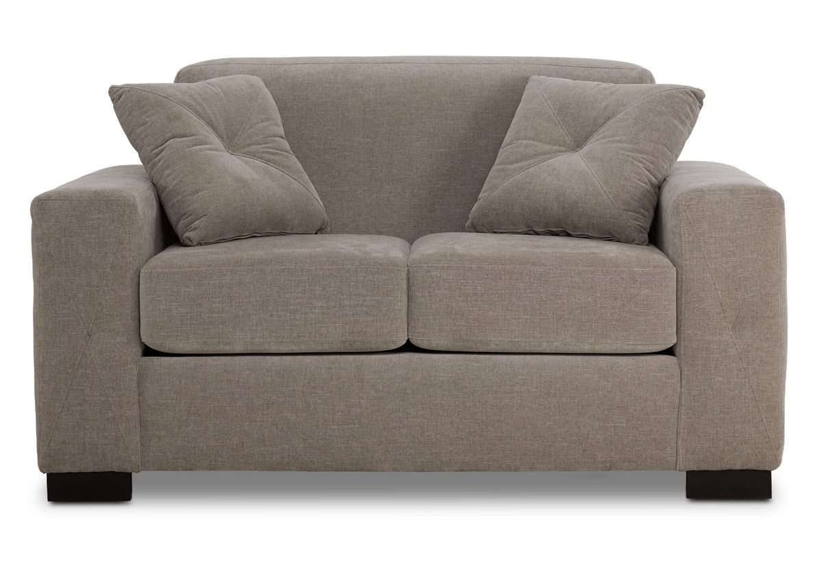 Valetta Loveseat - Wheat front view with two seat cushions, wide track arms and matching cross-stitched accent pillows