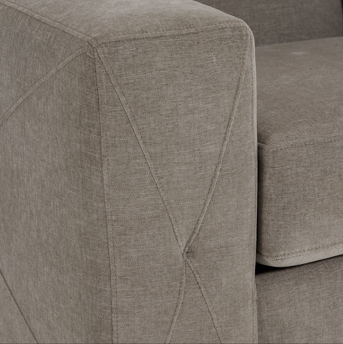 Valetta Sofa - Wheat close-up showing textured upholstery and stitched cross design on the wide track arm