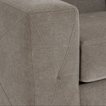 Valetta Loveseat - Wheat close-up showing textured upholstery and decorative cross stitching on the wide track arm