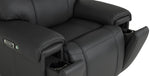 Velocity home theatre recliner close-up showing hidden cupholders in the front arm panels and dark grey upholstery