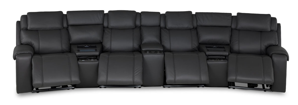 Velocity dark grey home theatre seating front view with power footrests extended and three integrated consoles