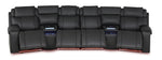 Velocity dark grey home theatre seating front view with extended footrests, illuminated consoles and base lighting