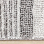 Zola 5'3" x 7'7" Patterned Rows Area Rug - Grey, White, Black