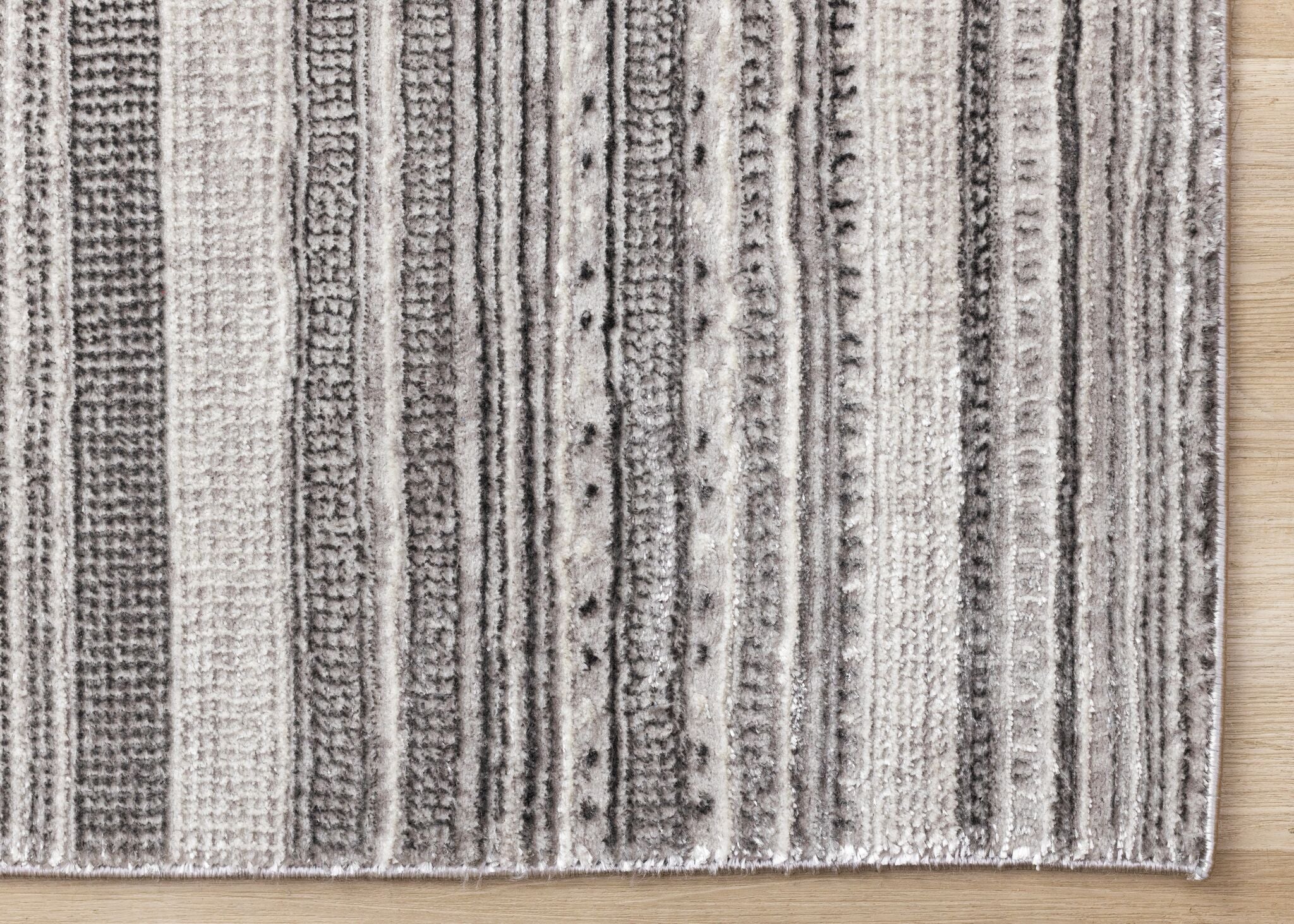 Zola 5'3" x 7'7" Patterned Rows Area Rug - Grey, White, Black