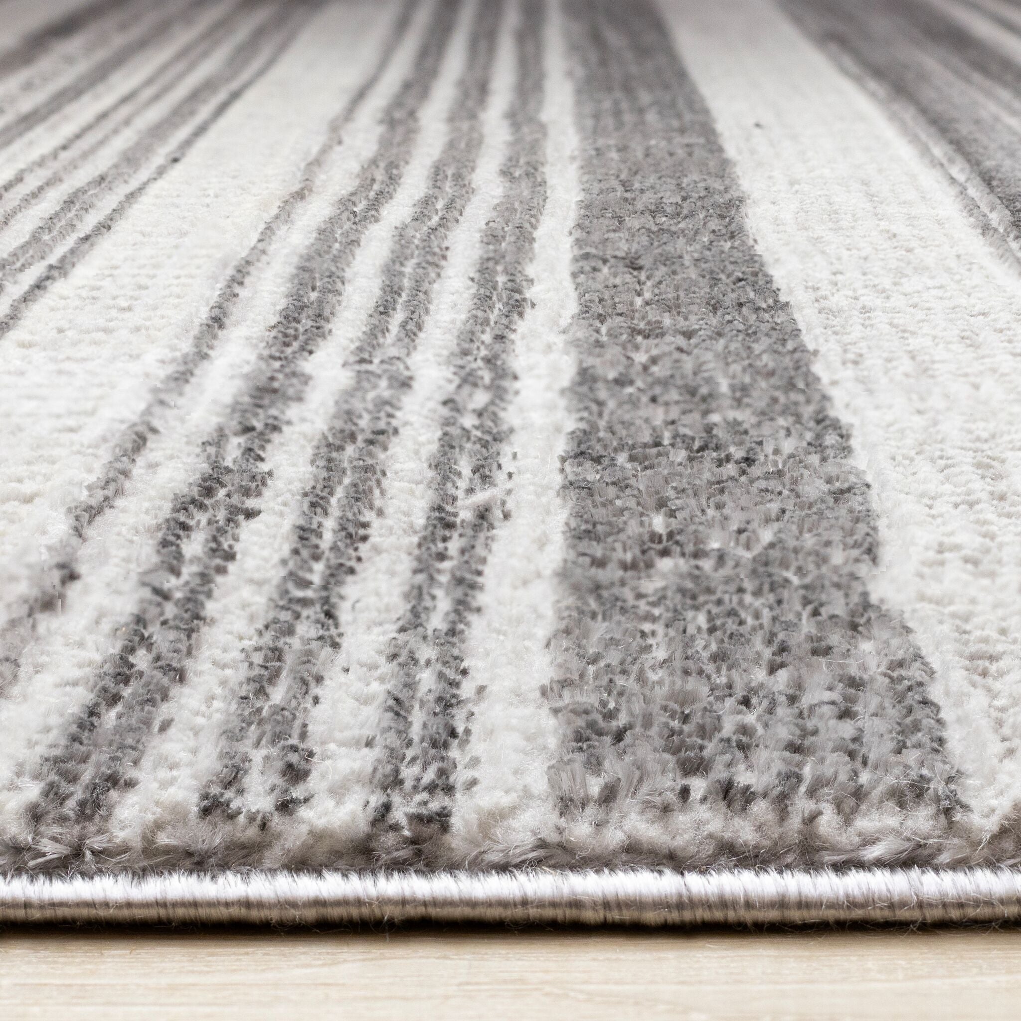 Zola 6'7" x 9'6" Patterned Rows Area Rug - Grey, White, Black