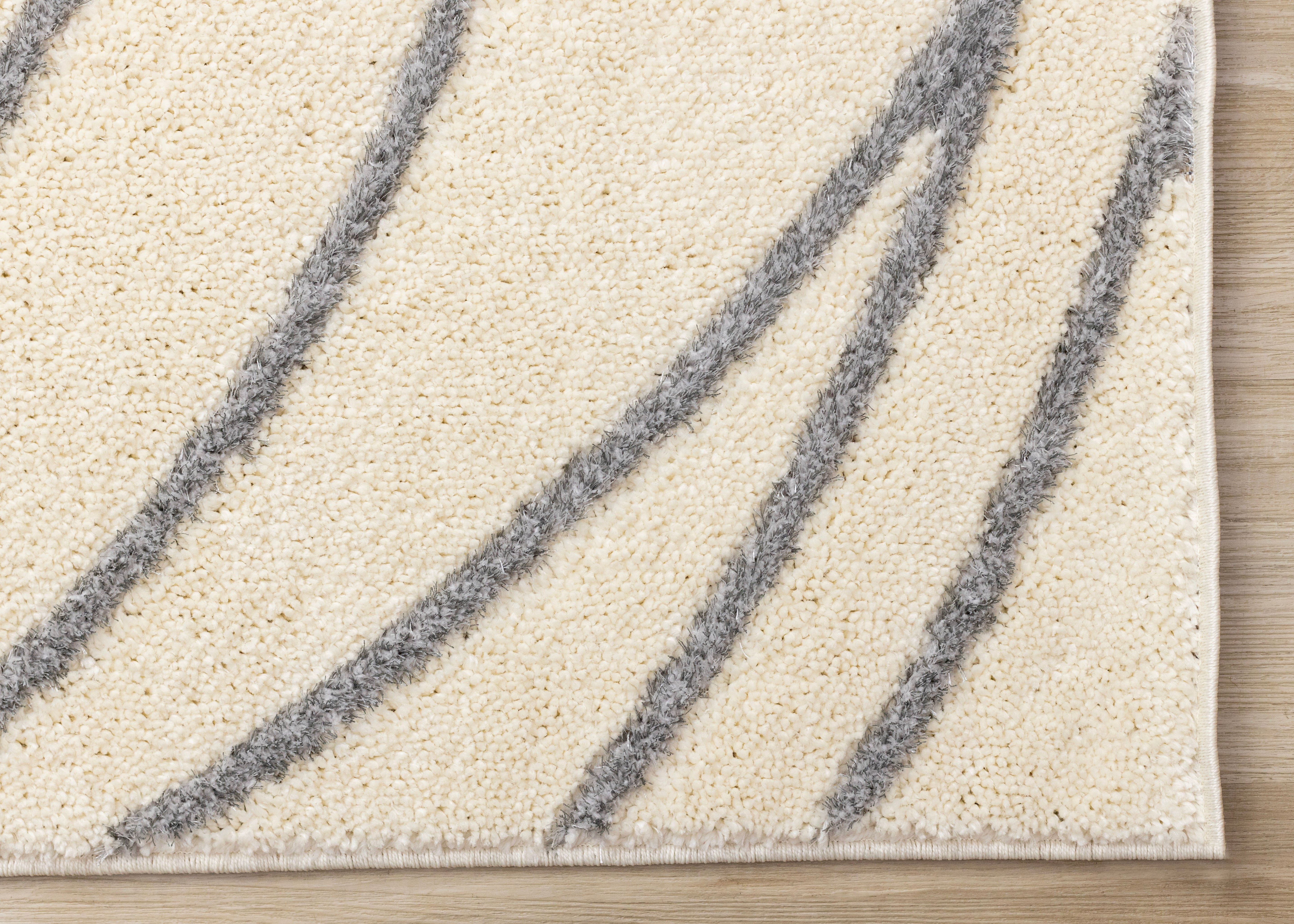 Sully 6'7" x 9'6" Circle Swirl Area Rug - Cream