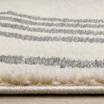 Sully 5'3" x 7'7" Circle Swirl Area Rug - Cream