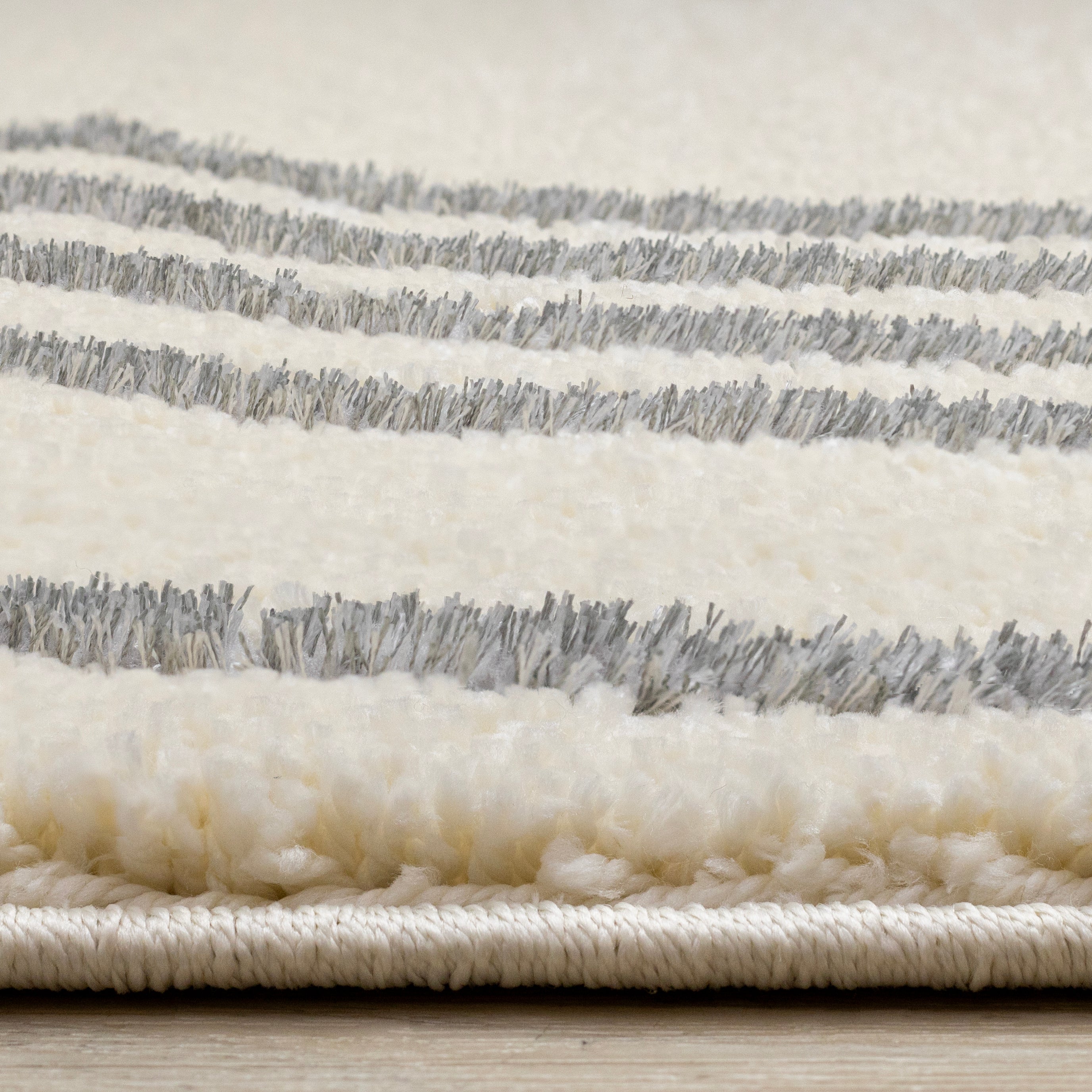 Sully 5'3" x 7'7" Circle Swirl Area Rug - Cream