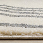 Sully 6'7" x 9'6" Circle Swirl Area Rug - Cream