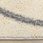 Sully 6'7" x 9'6" Circle Swirl Area Rug - Cream