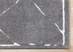 Obsidian 6'7" x 9'6" Broken Lattice Area Rug - Grey, White