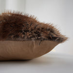 The Great Indoors 18 x 18" Faux Fur Cushion showing brown faux fur texture, smooth reverse and concealed zipper