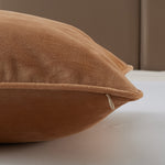 Close-up of The Great Indoors 18 x 18" Green Velvet Cushion showing soft velvet fabric, piped edge and concealed zipper