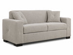 Valetta Sofa - Ivory angled view with two seat cushions, wide track arms, dark block feet and two accent pillows