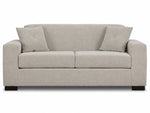 Valetta Sofa - Ivory front view with two seat cushions, wide track arms, dark block feet and matching accent pillows