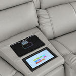 Velocity light grey console close-up showing touchscreen colour controls and illuminated wireless charging pad